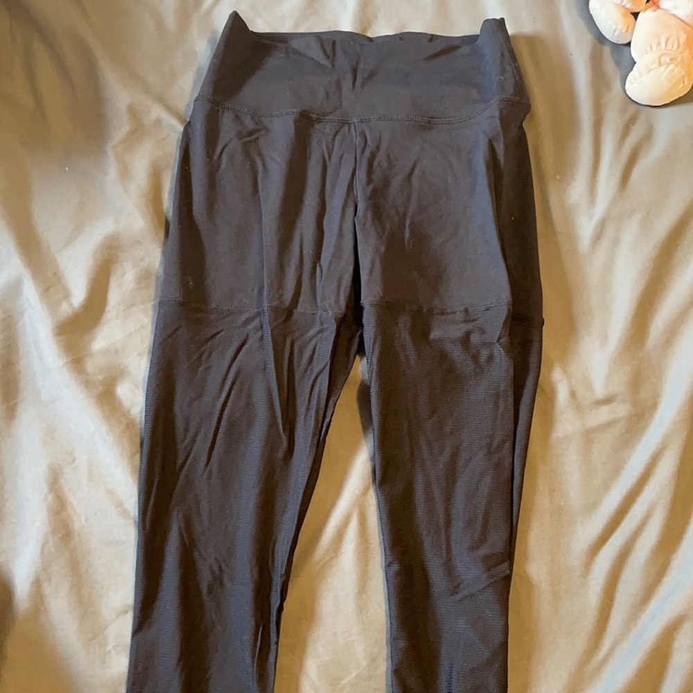 Black with mesh at bottom of legs